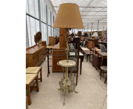 A BRASS VICTORIAN STANDARD OIL LAMP WITH MARBLE CENTRAL SHELF, WITH PROFUSELY DECORATED WITH FLOWERS AND PARTLY ROBED YOUNG W