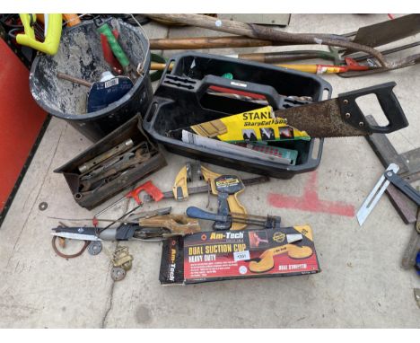 AN ASSORTMENT OF TOOLS TO INCLUDE CLAMPS, A SAW AND SPANNERS ETC 