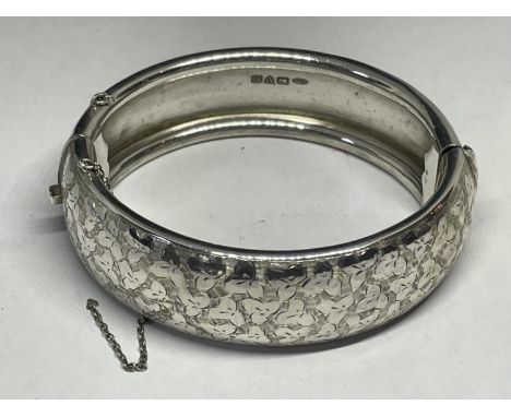 A HALLMARKED CHESTER SILVER BANGLE GROSS WEIGHT 41 GRAMS 