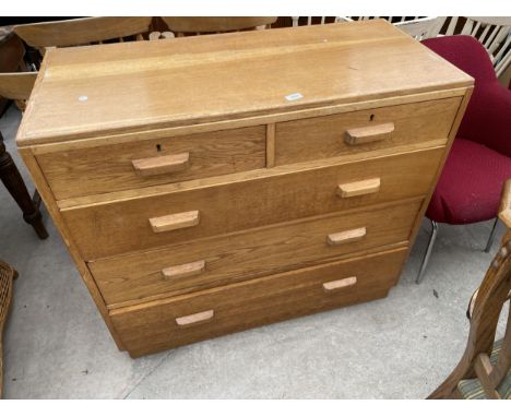 A MID 20TH CENTURY LIGHT OAK CHEST OF TWO SHORT AND THREE LONG DRAWERS, 42" WIDE 