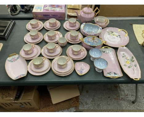 AN ANTIQUE PINK SET OF LIMOGES D&amp;C FRANCE M.A EPIAG MADE IN CZECHOSLOVAKIA TO INCLUDE TRIOS, SANDWICH TRAYS, A FOOTED BOW