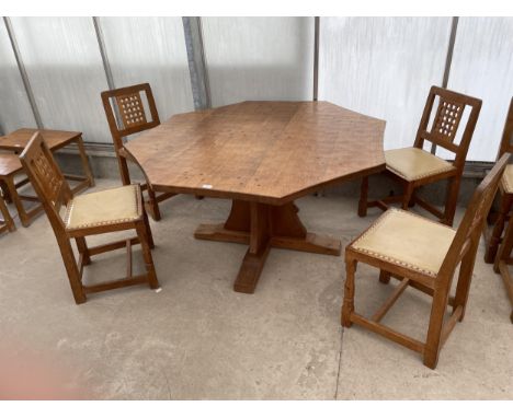 A MID 20TH CENTURY ROBERT 'MOUSEMAN' THOMPSON OCTAGONAL DINING TABLE ON CRUCIFORM STYLE BASE, 57" ACROSS AND 29" HIGH WITH AD