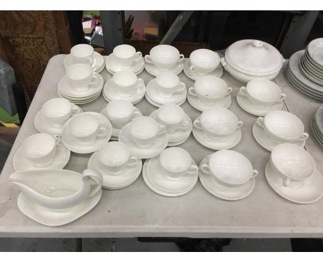 A QUANTITY OF WEDGWOOD WHITE CUPS, SAUCERS, PLATES, SAUCE BOAT, TUREEN, ETC 