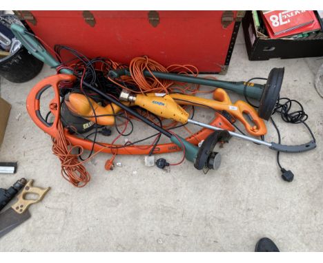 AN ASSORTMENT OF ELECTRIC GARDEN TOOLS TO INCLUDE GRASS TRIMMERS ETC 