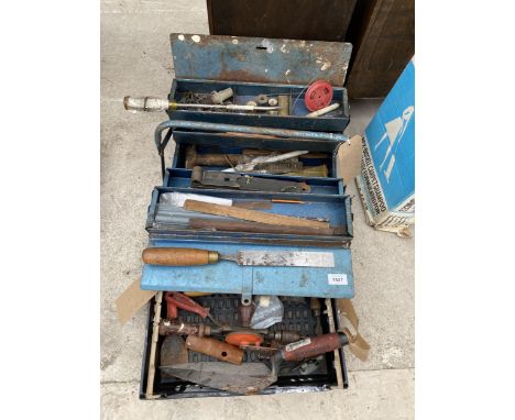 A METAL TOOL BOX AND AN ASSORTMENT OF TOOLS TO INCLUDE A BRACE DRILL, FILES AND CHISELS ETC 