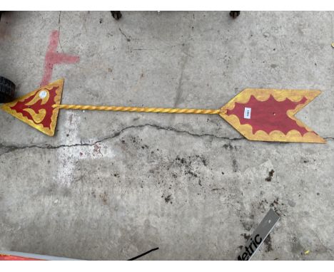 A METAL ARROW SIGN 