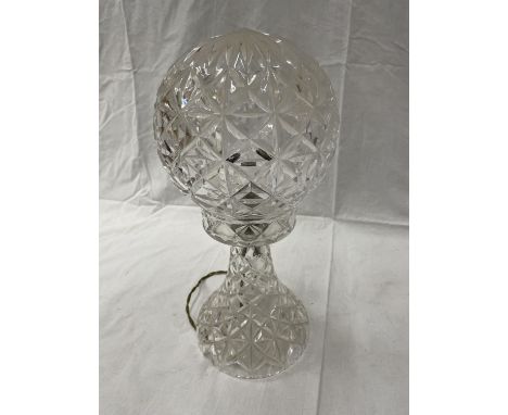 A CUT GLASS TABLE LAMP WITH MATCHING GLOBE SHADE 