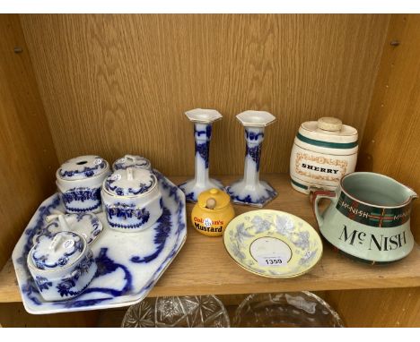 AN ASSORTMENT OF CERAMIC ITEMS TO INCLUDE A COLMANS MUSTARD POT, A MCNISH JUG AND BLUE AND WHITE CANDLE STICKS ETC 