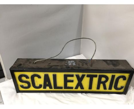 A SCALEXTRIC ILLUMINATED LIGHT BOX SIGN 62CM X 18CM X 10CM 