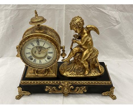 A 19TH CENTURY GILDED METALWARE 8 DAY MANTLE CLOCK BY THE ANSONIA CLOCK CO NEW YORK USA DATED JUNE 18TH 1882 ON EBONISED BASE
