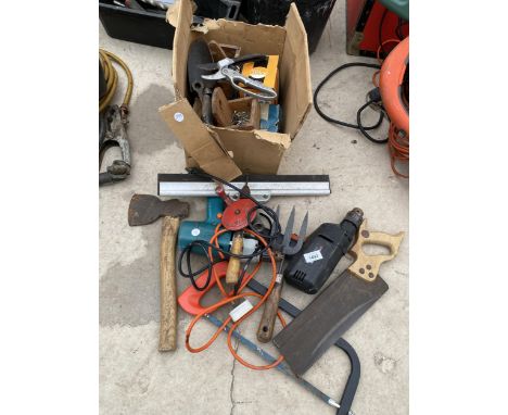 AN ASSORTMENT OF TOOLS TO INCLUDE TWO DRILLS, AN AXE AND A SAW ETC 