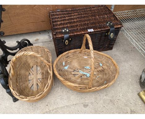 A WICKER PICNIC HAMPER AND TWO FURTHER WICKER BASKETS 