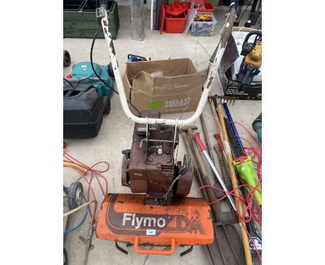 A FLYMO PETROL ENGINE GARDEN ROTAVATOR 