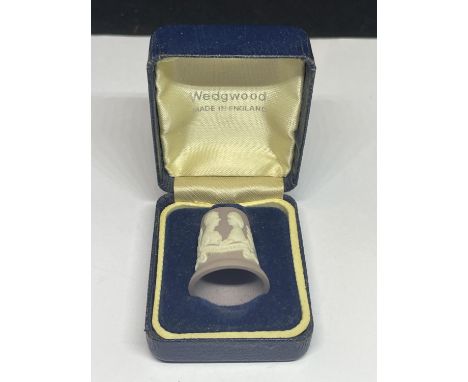 A RARE MAUVE COLOURED WEDGEWOOD JASPERWARE THIMBLE IN A PRESENTATION BOX 