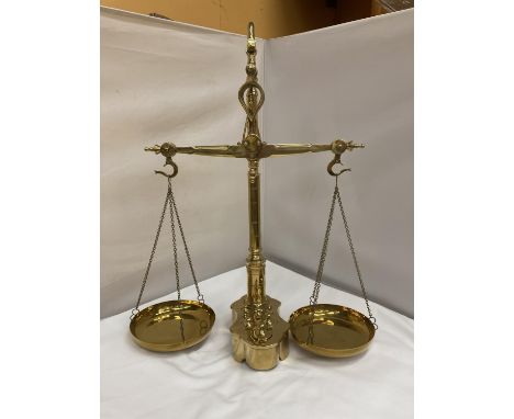 A SET OF BRASS BALANCE SCALES COMPLETE WITH WEIGHTS HEIGHT 56CM 
