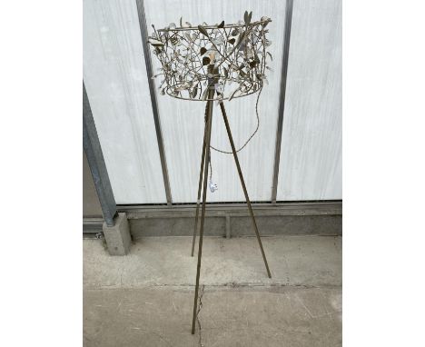 A DECORATIVE TRIPOD STANDARD LAMP 