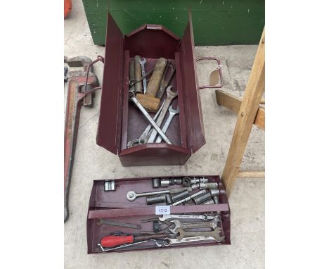 A METAL TOOL BOX AND AN ASSORTMENT OF TOOLS TO INCLUDE SOCKETS AND SPANNERS 