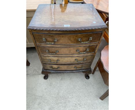 A WALNUT CHIPPENDALE STYLE CHEST OF FOUR DRAWERS ON OPEN BASE WITH CABRIOLE LEGS, 21.5" WIDE 