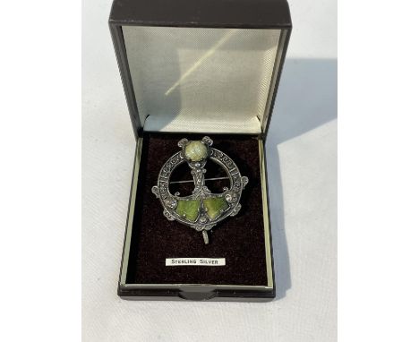 A CELTIC STYLE CLOAK PIN IN A PRESENTATION BOX 
