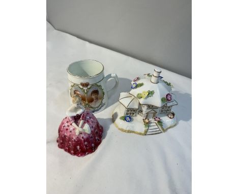 THREE CERAMIC ITEMS TO INCLUDE A ROYAL DOULTON VICTORIA FIGURE, A COALPORT THE PARASOL HOUSE AND A MINTON GEORGE V AND QUENN 