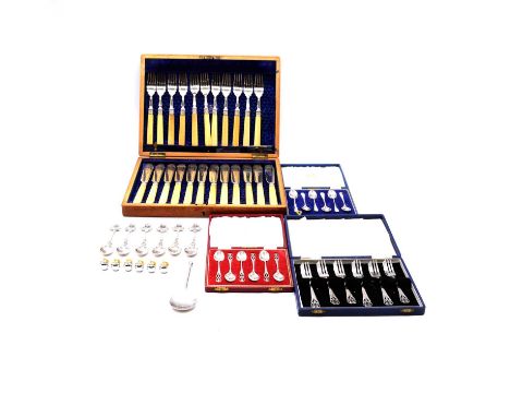 Three sets of silver teaspoons, a set of pastry forks, pewter spoon, set off six plated apple design menu holders and canteen
