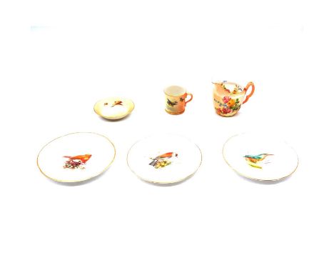 Royal Worcester blush ivory miniature cup and saucer, painted with birds, overall 5cm, a blush ivory jug painted with flowers