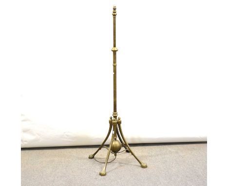 Arts and Crafts brass telescopic standard lamp, by WAS Benson, the plain column held by four supports terminating in feet, jo