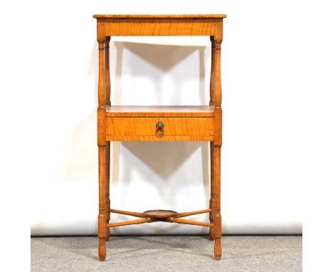 George IV satinwood and birdseye maple stand, the top with stringing, central shelf with drawer, turend legs joined by cross 