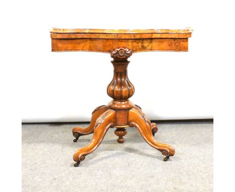 Victorian figured walnut card table, serpentine foldover top enclosing a tooled leather playing surface, melon fluted baluste