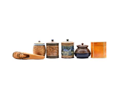 Three Doulton stoneware tobacco jars, including one barrel shaped, gilt scrolling design, 13cm, one inscribed and one Art Nou
