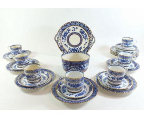 A Victorian blue and white tea service comprising seven cups and saucers, sugar, eleven side plates and sandwich plate