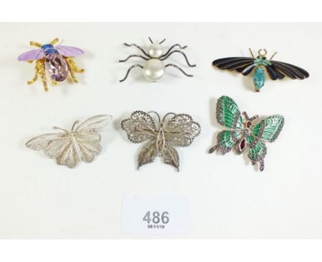 A selection of vintage insect brooches