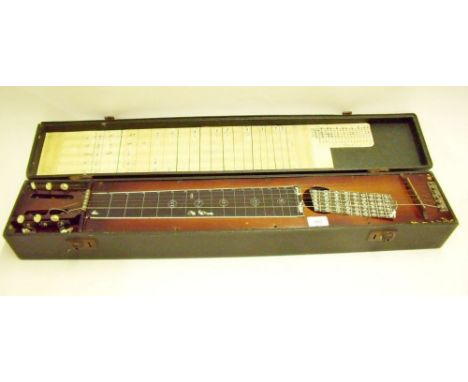 A vintage 'Attache' Hawaiian guitar in case