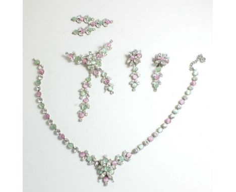 A vintage paste demi-parure set pink and green stones comprising: brooch, necklace and earrings