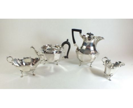 A silver four piece faceted tea service - total weight 898g, Birmingham 1896