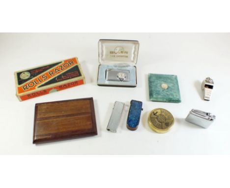 A group of various vintage lighters with other miscellaneous small collectables