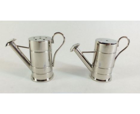 A novelty watering can garden themed cruet set