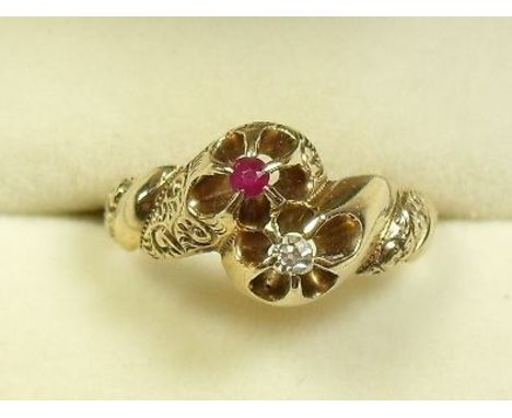 A 14k gold crossover ring set ruby and diamond - size M