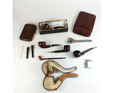 A box of smoking collectables including pipes, leather cigar wallets, pipe cutter etc