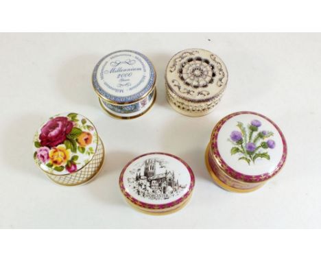 A group of five porcelain trinket boxes
