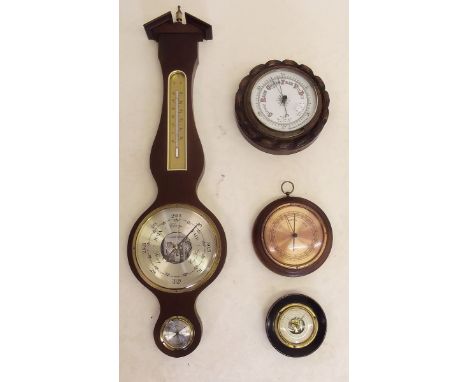 Four vintage barometers, one in circular barley twist wooden case