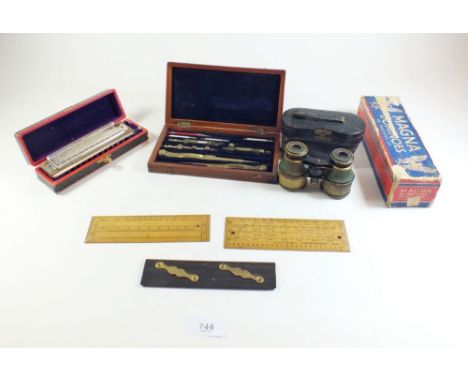 A drawing set, three rulers, opera glasses and harmonica plus a set of Magna dominoes