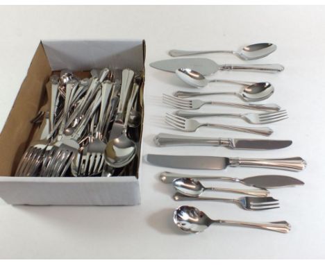 An extensive Oneida stainless steel six place setting cutlery set