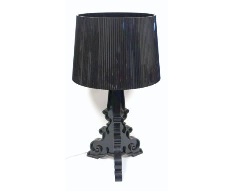 Kartell Mod. Bourgie designed by F Lavani black plastic triple light table lamp on 3 scroll supports, with a fluted shade, H 