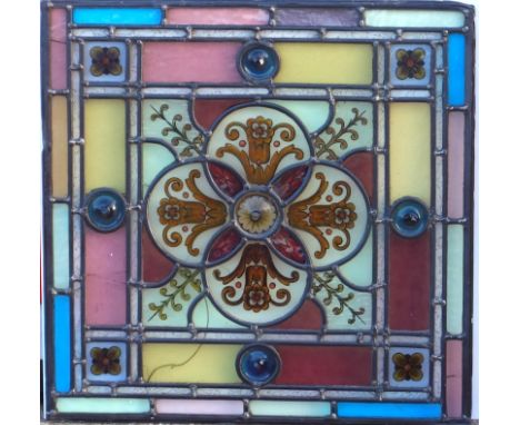 Edwardian lead stained glass panel with roundels and floral decoration, 50 x 50cm, and an Arts and Crafts oak firescreen inse