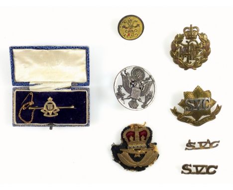 9ct gold Royal Army Ordnance Corps brooch, 2 grams, cased, RNZAF cap badge, Shanghai Volunteer Corp badges and others. 