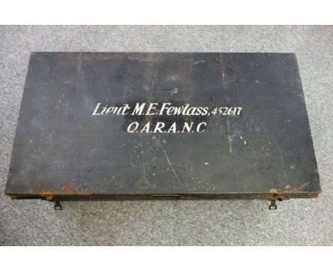 Japanned metal trunk, the cover inscribed 'Lieut. M E Fewlass, 425617, 'Q.A.R.A.N.C.', W.90.5 cm, cap (in Royal Air Force blu