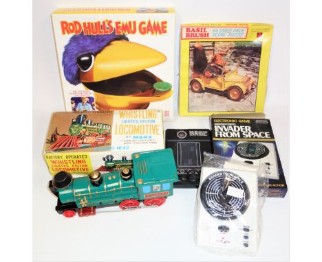 A Marx Whistling Locomotive with shaking Head, in original box, a Corgi Rockets Super Autobatics Speedset, boxed, two Merit P