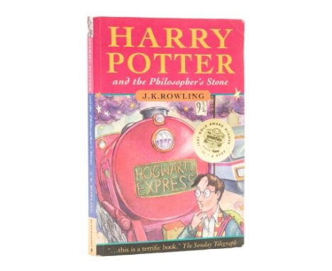 Rowling (J.K.) Harry Potter and the Philosopher's Stone, eleventh printing paperback edition, signed by the author on half-ti