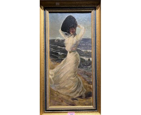 W R Lavender:&nbsp; Edwardian lady in white dress and hat on a windswept beach, oil on canvas, signed, 52 x 24cm, framed